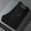 Marca Italiana de Alta Qualidade Tendência Outono e Inverno Juventude Elástico Slim Reto Jeans Preto Estampado de Veludo Espessado para Homens
