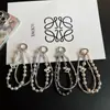 Nueva Cadena de Muñeca para Teléfono Móvil de Aleación de Cristal Ins con Colgante de Caballo Perla Lanyard Elegante para Bolso Doble Capa Exquisita
