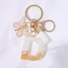 Llavero Colgante de Borla con Letra Inglesa Personalizada de Purpurina Blanca con Resina Epoxi y Colgante de Resina con Pan de Oro, Llavero Sencillo