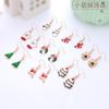 Aretes de Navidad Aretes de botón de Navidad Copo de nieve Año Nuevo Dibujos animados Árbol de Navidad Aretes colgantes Lote mixto Elementos navideños