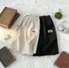 Pantalones Deportivos Casuales de Color Sólido de Moda Juvenil Primavera y Otoño Marca de Moda Shorts de Cinco Puntos Corte Holgado Nuevos Shorts para Hombre