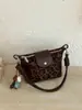 Bolso vintage de venta caliente transfronterizo para mujer, nuevo bolso de hombro versátil de moda 2026, bolso de axila, bolso tipo empanada para ir al trabajo