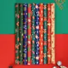Papel de regalo de Navidad en stock al por mayor transfronterizo superventas nuevo regalo regalo ramo embalaje fabricantes de papel kraft