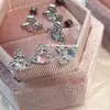 Brinco de Osso da Orelha Planeta Cheio de Diamantes Titânio Aço Parafuso Coclear Brincos de Design Único com Pingente de Saturno para Mulheres