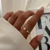 Anel Cruzado Nova Moda Retrô de Alto Padrão Olho de Tigre Aço Titânio Não Desbota Anel de Dedo Feminino Personalidade Textura Martelada Zircônia Incrustada