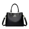 Bolsas Femininas Novo Estilo 2026 Bolsa Transversal de Ombro Moda Feminina Bolsa de Mão Elegante Estilo Europeu e Americano Atacado