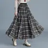 Falda de retazos a cuadros reversible para mujer, nueva falda de cintura alta con corte en A adelgazante para otoño/invierno 2026, falda elegante y versátil