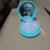 Peine de Masaje Integrado Plegable para Estudiantes Portátil Espejo de Maquillaje Peine Pequeño con Bolsa de Aire Esponjoso Plegable Transfronterizo