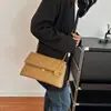 Bolso de textura de moda para mujer, nuevo bolso de moda acolchado con cadena para principios de otoño de 2026, bolso de hombro y cruzado de nicho para damas