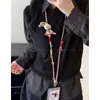 ¡Peluche suave y abrazable! Muñeca de tela de dibujos animados, correa tejida para teléfono, perfecta para mujeres, viajes y para prevenir pérdidas o daños durante los viajes, un accesorio portátil