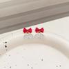 Pendientes de botón con lazo rojo festivo de Año Nuevo con aguja de plata S925, diseño de nicho, pendientes de campana de cristal, pendientes de temperamento para mujer