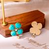 Aretes de aguja de plata S925 de alto sentido turquesa flor de cuatro hojas nicho moda de lujo ligero aretes de temperamento simple venta al por mayor