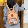 Mochila Popular de Estilo Japonés para Niña Linda Bidimensional Cruzada Mochila de Muñeco de Dibujos Animados Bolso de Estudiante Serie Bolso Transparente para Pines