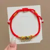 Pulseira de corda colorida zongzi do Festival do Barco-Dragão 2026 novo modelo pulseira trançada artesanal étnica infantil atacado corda vermelha