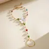 Collar multicapa de flor de resina estilo europeo y americano con gotas de aceite y diamantes, cadena de clavícula de dopamina personalizada, pulsera y collar de alta gama