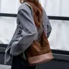 Bolso Cubo de Cuero Texturizado Mate de Nicho para Mujer Otoño Temprano 2025 Bolso de Hombro Diario Ropa de Trabajo Versátil Bolso Cruzado Casual