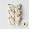 Paquete de 3 decoraciones de mariposas de plumas, con clips de mariposa realistas y tridimensionales, con brillo dorado reluciente, perfectas para decoraciones de Navidad