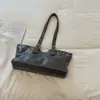 Bolsa Casual Retro Xiaomi Estilosa para Mulheres 2026 Nova Bolsa de Ombro Grande Capacidade para o Dia a Dia Bolsa Tote de Mão Simples e Fashion