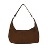 Bolso Pequeño de Hombro Sencillo Casual de Cuero Suave Estilo Nicho para Mujer 2026 Nuevo Versátil Popular para el Trabajo y el Viaje Bolso de Mano
