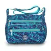 Bolso Cruzado de Hombro Personalizado Nuevo Simple Literario Casual Tela Lavada Impermeable Lona Tela de Nylon Estilo Coreano Bolso de Moda para Mujer