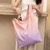 Bolsa de compras plegable con degradado rosa y morado, bolsa de mano de poliéster portátil y plegable estilo ins, artículo popular transfronterizo para niñas