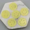 Colgante llavero de acrílico de color sólido de 24 mm con esmalte, plano, de doble cara con cara sonriente, accesorios de joyería hechos a mano DIY