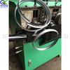 Máquina de bobina de volante tira de acero hierro plano máquina formadora de anillo de ranura de presión CNC hidráulica automática máquina de bobina de acero