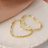 Pendientes Transfronterizos para Mujer, Lujo Ligero, Diseño de Alta Gama, Estilo de Nicho, Aros Exagerados para Rostros Cuadrados y Redondos, Círculos Grandes Lisos
