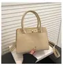 Bolso Cubo Portátil Retro 2026 Comercio Exterior Invierno Nueva Moda Bolso de Hombro Texturizado Bolso Cruzado Casual Versátil