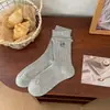 Calcetines bordados de dibujos animados para mujer, otoño e invierno, estilo preppy, de longitud media hasta la pantorrilla, estilo japonés con bordes enrollados, con lindos diseños de letras y cachorros, sin costuras y afelpados