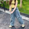 Pantalones vaqueros de estilo occidental para niñas, de primavera y otoño, con personalidad infantil, estilo coreano moderno, holgados, con agujeros y pierna ancha.