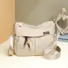 Tendencia Transfronteriza Otoño e Invierno 2025 Nuevo Bolso Cruzado de Hombro de Gran Capacidad para Mujer Bolso de Axila para Viaje Diario Tela de Nylon
