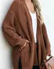 Cárdigan de punto hueco europeo y americano transfronterizo para mujer, longitud media, holgado, estilo casual, abrigo de otoño e invierno, color liso, casual