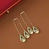 Brincos Longos Metálicos Europeus e Americanos Transfronteiriços com Borla Gota D'água Elegantes Brincos Stud Koreanos de Alta Qualidade Simples Brincos de Estilo Frio