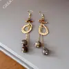 Aretes Irregulares de Madera Redondos Huecos Estilo Étnico Personalidad Retro Pendientes para el Trabajo Pendientes de Nicho de Alta Gama para Mujer