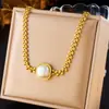 Elegante collar de corazón de doble capa, cadena de acero inoxidable chapada en oro de moda de nicho transfronterizo, cadena para la clavícula de lujo ligero para mujer