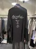 Tug Coréia Dongdaemun 2026 Primavera Nova Camiseta Feminina Gola Redonda Solta Raglan Manga Longa com Escrita nas Costas