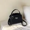 Bolso de Mano de Nicho de Gama Alta para Mujer 2026 Nuevo Verano Moda de Gama Alta Versátil de Hombro Cruzado Bolso Cuadrado Pequeño