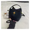 Bolso tipo cubo retro de moda estilo coreano para mujer, nuevo bolso de hombro de alta gama de moda 2026, bolso de mano y bolso cruzado versátil