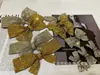 Flor de zapato con pedrería al por mayor Pasador para ropa y cabello Accesorios de bricolaje Accesorios Pedrería Super Brillante Estéreo Lazo