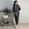2025 Moda Europeia e Americana Outono e Inverno Amazon Venda Quente Tecido Fleece Moda Carimbo de Couro Manga Longa com Capuz Casual Conjunto Esportivo