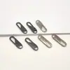 Gancho de Puxador Destacável em Liga de Zinco Jaqueta Bolsa Fivela de Trava de Zíper Universal Pingente Cabeça de Zíper Chaveiro Universal