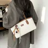 Bolsa feminina de luxo 2026 nova moda tendência versátil bolsa de ombro grande capacidade sacola de trabalho bolsa balde