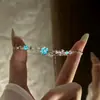 Pulsera de Trébol de Cuatro Hojas Deseo Estelar para Mujer estilo ins Lujo Ligero Diseño de Nicho Joyería de Mano Esmaltada Luminosa Regalo de Cumpleaños para Novia