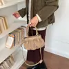 Bolso nube de gamuza con lazo estilo coreano de nicho para mujer, nuevo bolso de hombro y cruzado de moda 2026 para commuting