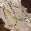 Nuevo Collar con Colgante de Flor de Ciruelo China, Ojo de Tigre y Ciervo, Lujo Ligero, Diseño de Nicho, Cordón Hecho a Mano, Accesorio de Moda Versátil para Mujeres
