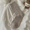 Calcetines de lana para mujer, calcetines de media pantorrilla para otoño e invierno, calcetines cálidos y gruesos de cachemir de doble punto, calcetines de invierno de punto trenzado de moda estilo coreano para mujer