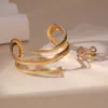E095 Joias transfronteiriças europeias e americanas, anel e pulseira geométricos irregulares, estilo elegante e de luxo leve, pulseira aberta ajustável