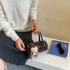 Bolsa de poá nicho super popular estilo coreano para mulheres, nova bolsa transversal versátil e estilosa 2026, bolsa de mão requintada, bolsa cilíndrica