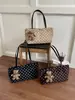 Bolso de mano, bolso de hombro y bolso de axila nuevo estilo coreano, de nicho y exquisito para el trabajo, con diseño de bolsa tote de lunares para mujer, 2026